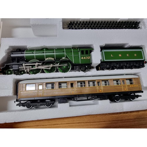 209 - A rare Hornby R869 Flying Scotsman train set, 3 teak coaches, controller and track, with locomotive,... 