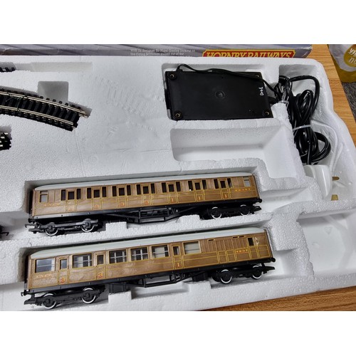 209 - A rare Hornby R869 Flying Scotsman train set, 3 teak coaches, controller and track, with locomotive,... 