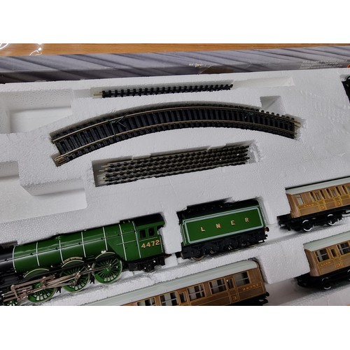 209 - A rare Hornby R869 Flying Scotsman train set, 3 teak coaches, controller and track, with locomotive,... 