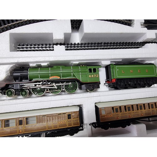 210 - A rare complete Hornby R824 Flying Scotsman deluxe set to include cardboard tunnel and single track ... 