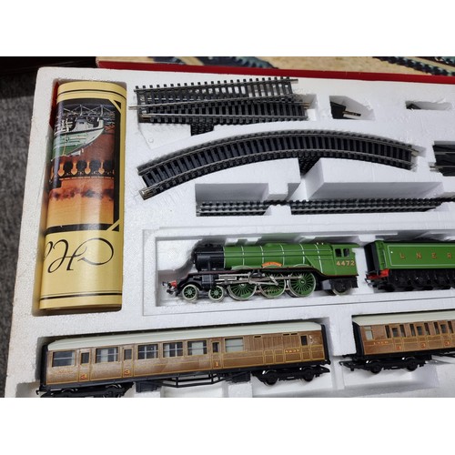 210 - A rare complete Hornby R824 Flying Scotsman deluxe set to include cardboard tunnel and single track ... 