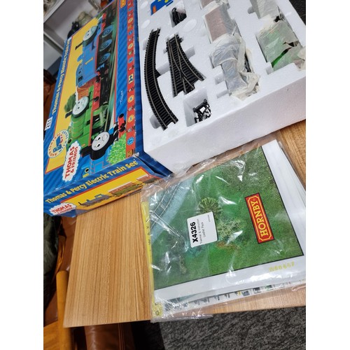 211 - A brand new and boxed Hornby R9045 Thomas and Percy electric trainset, still has original packaging ... 