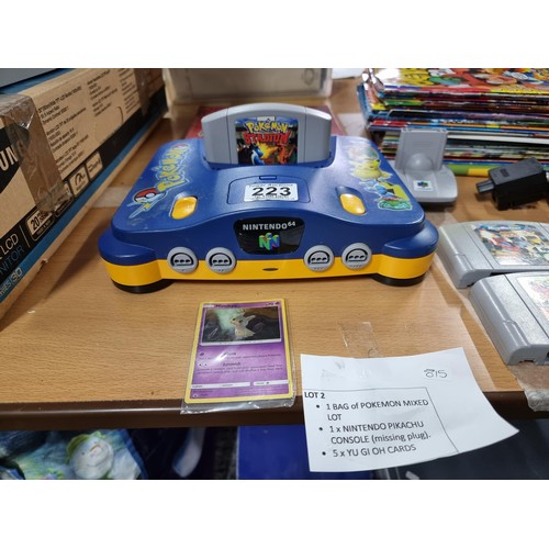 223 - A limited edition Nintendo 64 Pokémon edition console complete with 5 games, controller (No power le... 