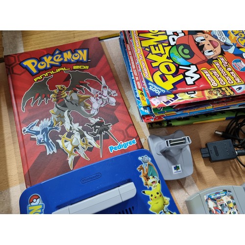 223 - A limited edition Nintendo 64 Pokémon edition console complete with 5 games, controller (No power le... 