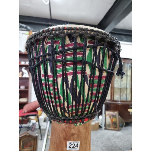 224 - A large good quality Djembe drum of very good quality construction, featuring a good drum skin which... 