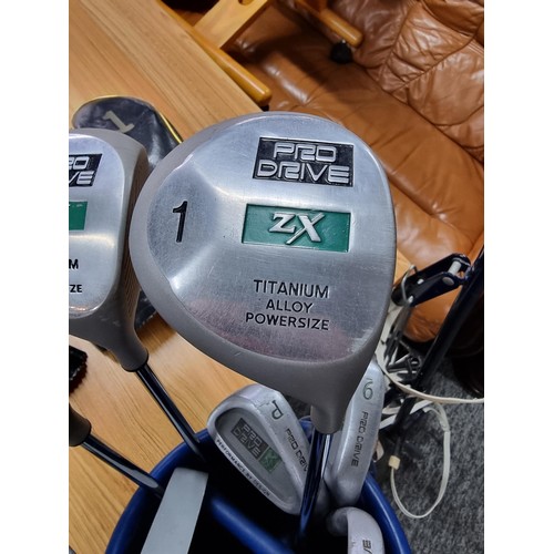 226 - A complete golf set by pro drive to include a full set of irons 3 woods and a putter from the ZX ran... 