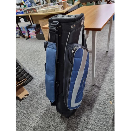 229 - A good quality modern Nike golf bag with large padded pockets and a large padded strap, in clean con... 