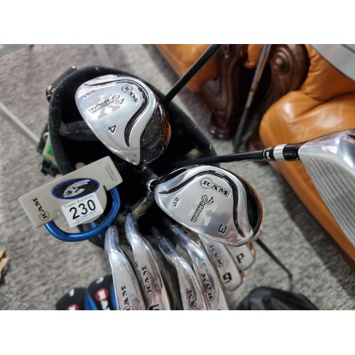 230 - A comprehensive full golf set to include a set of irons and 4 woods and a putter, all the Ram from t... 