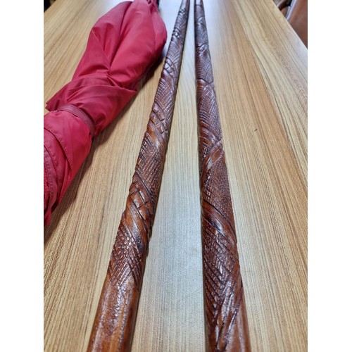 231 - An unusual double umbrella for 2 people by Cincinnati Milacron along with 2 good solid wood walking ... 