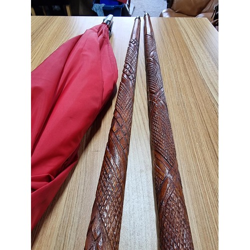 231 - An unusual double umbrella for 2 people by Cincinnati Milacron along with 2 good solid wood walking ... 