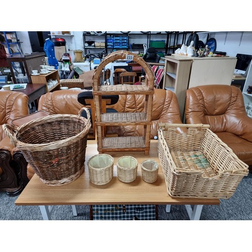 233 - A quantity of wicker items to include an arched wicker shelfing unit, (can be hung or free standing)... 