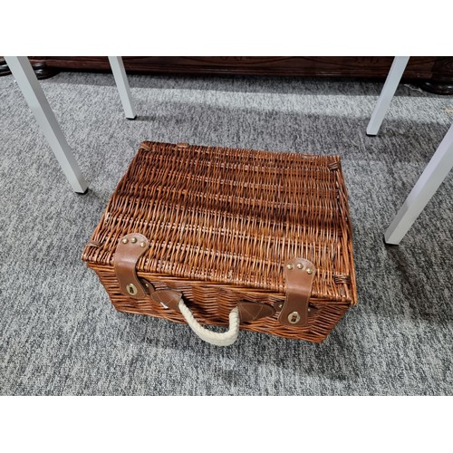 233 - A quantity of wicker items to include an arched wicker shelfing unit, (can be hung or free standing)... 