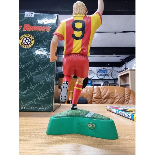 237 - A large Roy of the Rovers figurine with its original box by Robert Harrop. Marked to the base Roy of... 