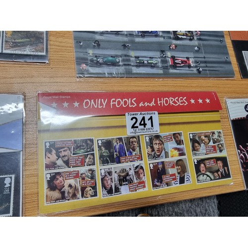 241 - A collection of 12x commemorative Royal Mail  mint stamp sets to include Only Fools and Horse, Harry... 