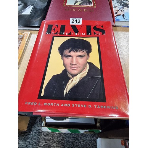 242 - A lot all relating to Elvis Presley, to include 4 hardback books, a collectors edition Elvis watch a... 