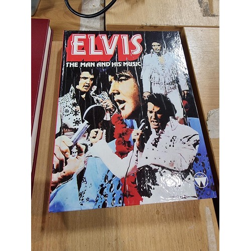 242 - A lot all relating to Elvis Presley, to include 4 hardback books, a collectors edition Elvis watch a... 