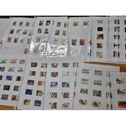 248 - A large quantity of organised stamps to include 25 sheets of various British stamps and 2 stamp albu... 