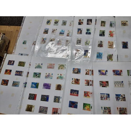 248 - A large quantity of organised stamps to include 25 sheets of various British stamps and 2 stamp albu... 