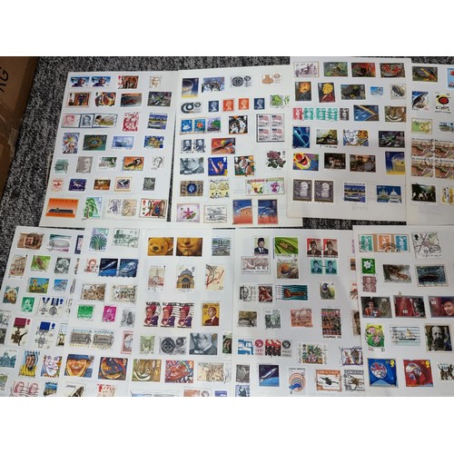 249 - A very large quantity of organised stamps all on pieces of card, containing stamps from around the w... 