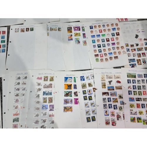 249 - A very large quantity of organised stamps all on pieces of card, containing stamps from around the w... 