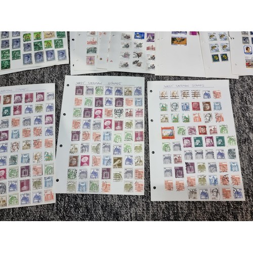 249 - A very large quantity of organised stamps all on pieces of card, containing stamps from around the w... 