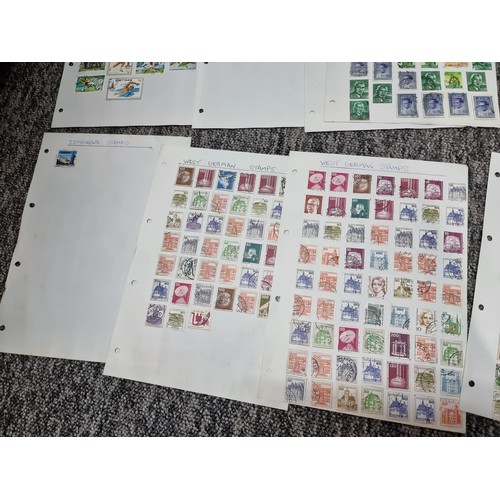 249 - A very large quantity of organised stamps all on pieces of card, containing stamps from around the w... 