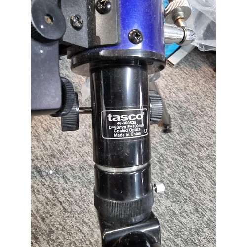 258 - A Tasco Galaxsee telescope on tripod stand D=60mm and F=700mm, in good condition.