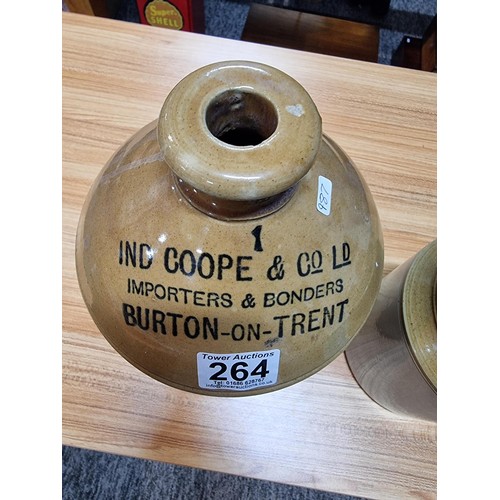 264 - A vintage stoneware flagon along with a large stoneware pot, the stoneware flagon is marked for Ind ... 