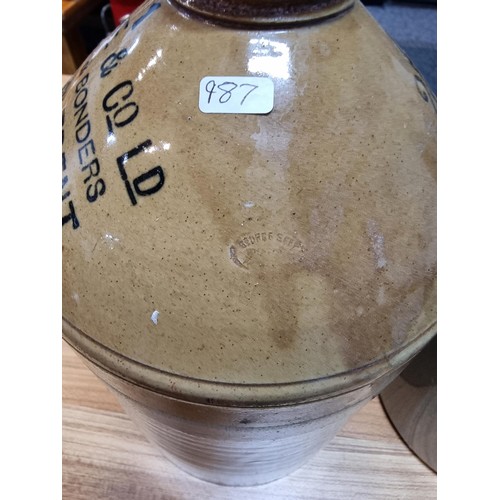 264 - A vintage stoneware flagon along with a large stoneware pot, the stoneware flagon is marked for Ind ... 