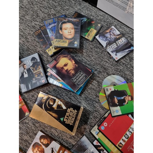 265 - 2 bags of mostly DVD's and DVD box sets along with a quantity of odds to include many box sets of CS... 