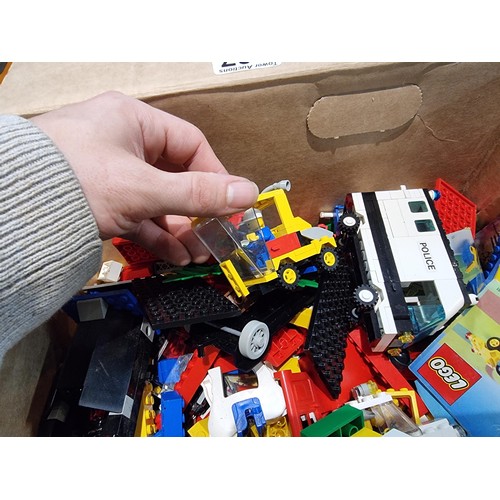 267 - A large job lot of 4 boxes of Lego, 3 of the boxes all contain genuine Lego some which are already m... 