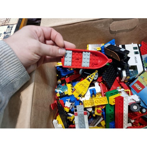 267 - A large job lot of 4 boxes of Lego, 3 of the boxes all contain genuine Lego some which are already m... 