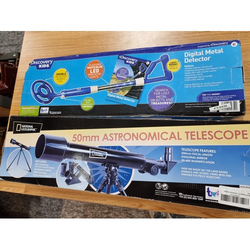 270 - A boxed National Geographic 50mm telescope along with a boxed Discovery Kids digital metal detector.... 