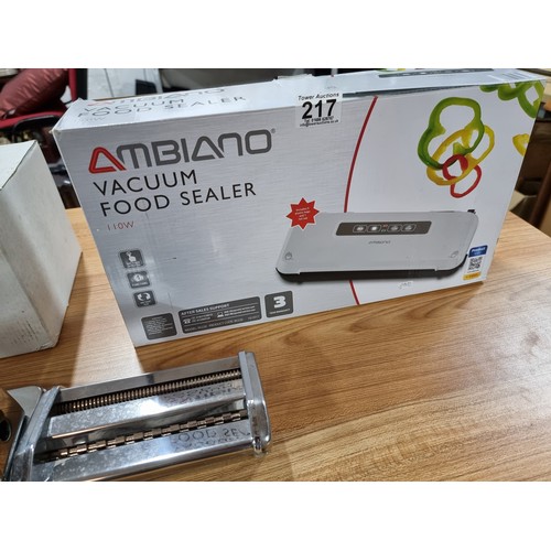 217 - A boxed pasta maker by Vogue along with a box Ambiano vacuum food sealer, both in excellent conditio... 