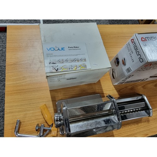 217 - A boxed pasta maker by Vogue along with a box Ambiano vacuum food sealer, both in excellent conditio... 