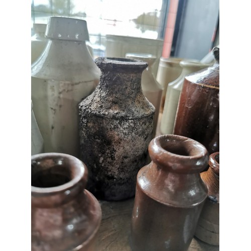 24 - Large quantity of 24x stoneware and earthen ware bottles and pots of various sizes 14x are cream 10x... 