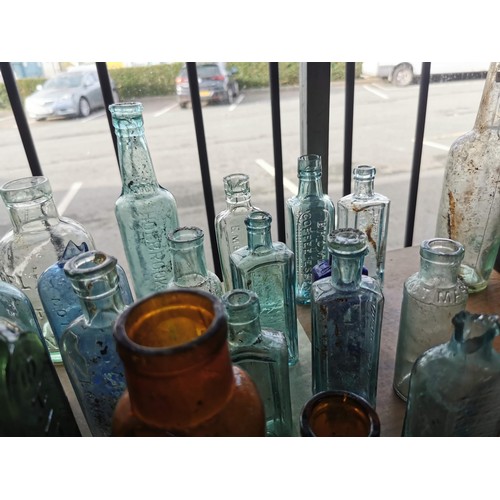 28 - Large quantity of approx 39x vintage and antique bottles of various sizes and brands inc Mellin's in... 