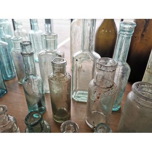 29 - Large collection of approx 31x vintage and antique bottles of various sizes and brands inc imperial ... 