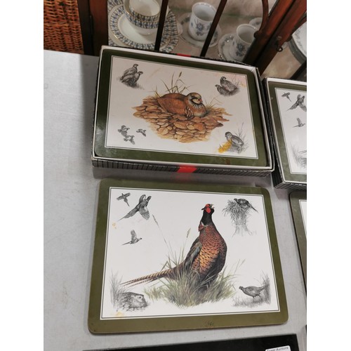 41 - 3x granite black place mats and cup mats along with 2x boxes of 6x game bird placemats