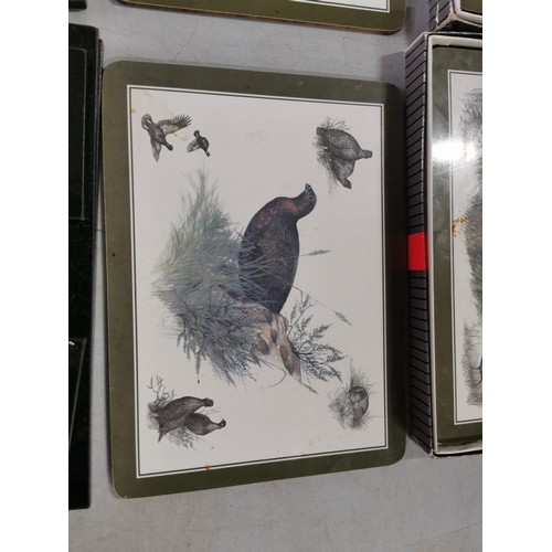 41 - 3x granite black place mats and cup mats along with 2x boxes of 6x game bird placemats