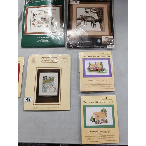 48 - 10 packets of new counted crossstich of various picture designs inc swan, zebra, buildings, birds et... 