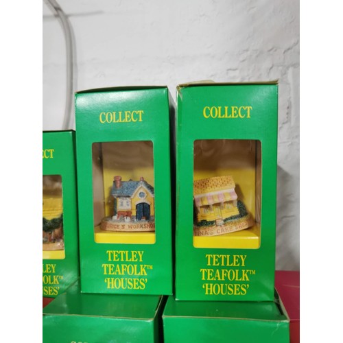 53 - Quantity of 20x The Tea Tetley tea folk boxed figurines and houses inc Gordon's potting shed, Sidney... 