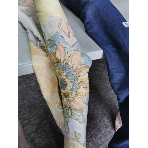 56 - Quantity of rolls of fabric inc blue denim style, tulip design cotton roll, floral design etc