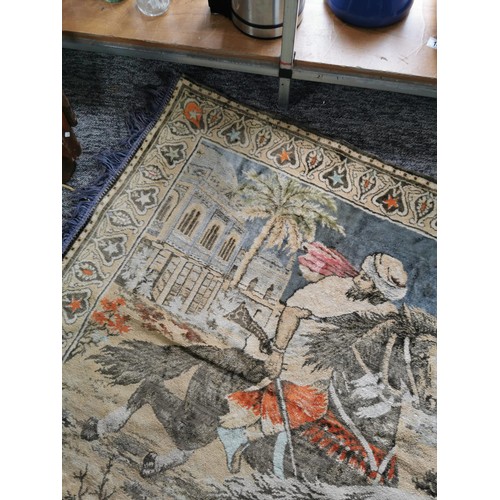 66 - Vintage handmade wall rug depicting an arabic scene with horses along with a Black & Decker dustbust... 