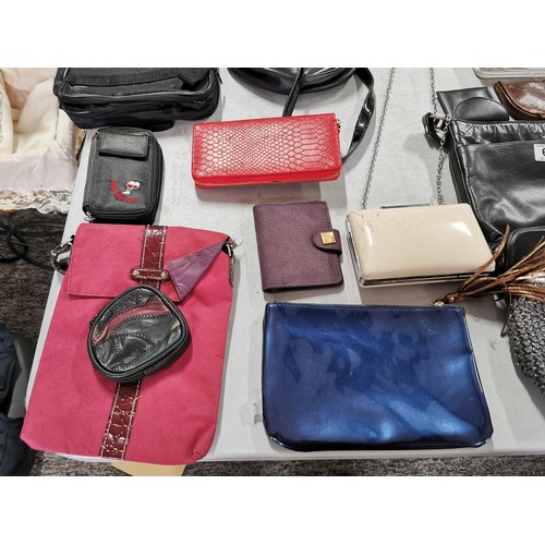 67 - Large collection of handbags, clutch bags and purses of various brands Michael Cors, Debonair etc