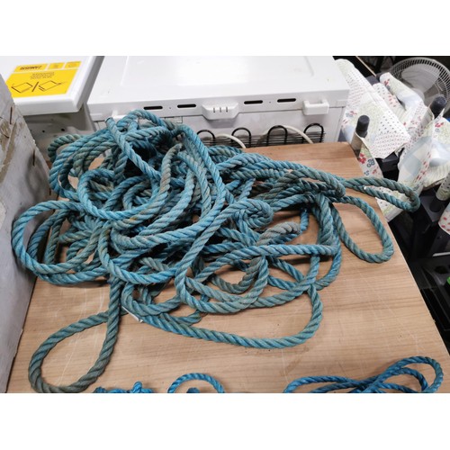 105 - Box containing a quantity of various sized blue nylon rope, thickest rope has a diameter of 3cm