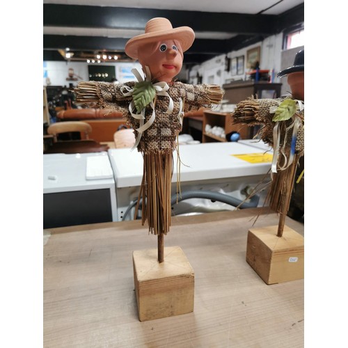 112 - Well made wooden hanging bird table along with 2x terracotta garden figures on wooden bases, bird ta... 