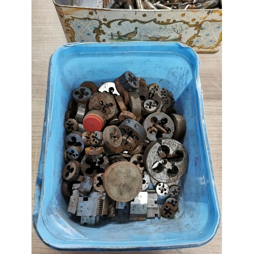 117 - A large quantity of engineering tools to include tap and dies, drill bits, augers etc