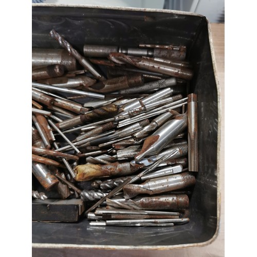 117 - A large quantity of engineering tools to include tap and dies, drill bits, augers etc