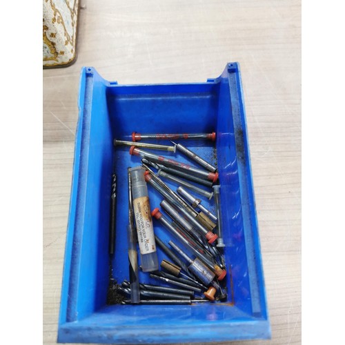 117 - A large quantity of engineering tools to include tap and dies, drill bits, augers etc